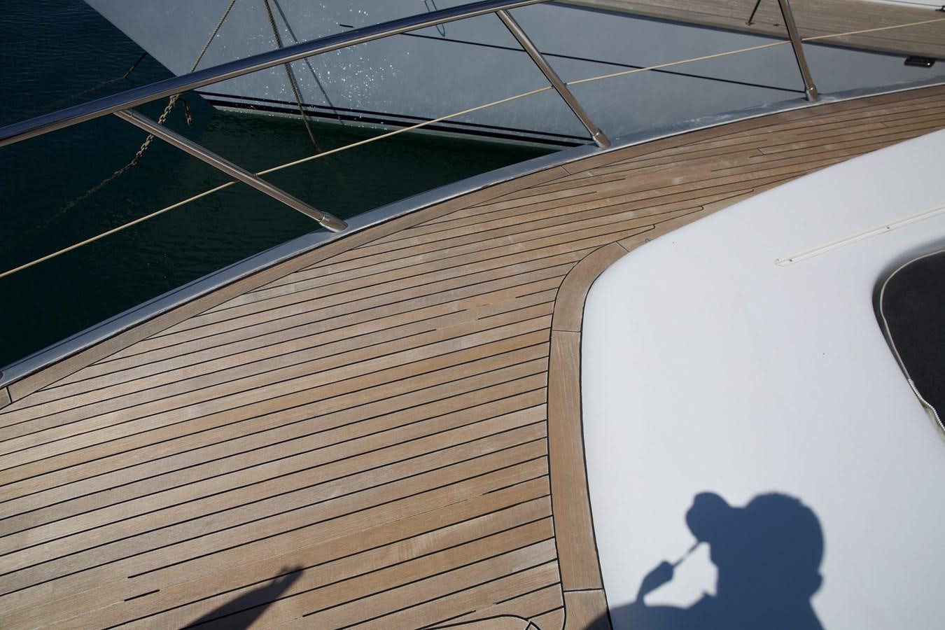 a close-up of a wooden boat aboard SILVER SKY Yacht for Sale