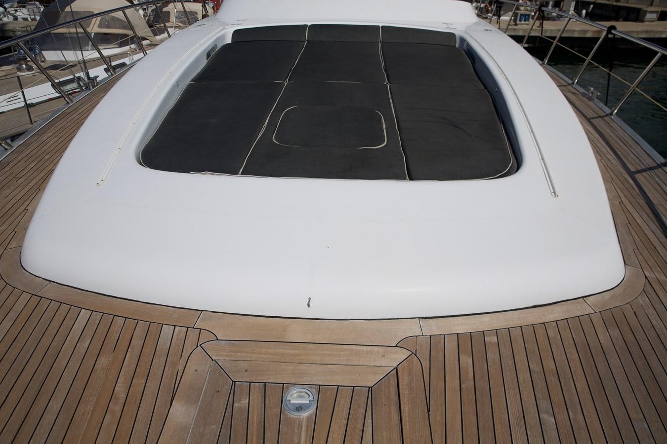 a white rectangular object on a wooden surface aboard SILVER SKY Yacht for Sale
