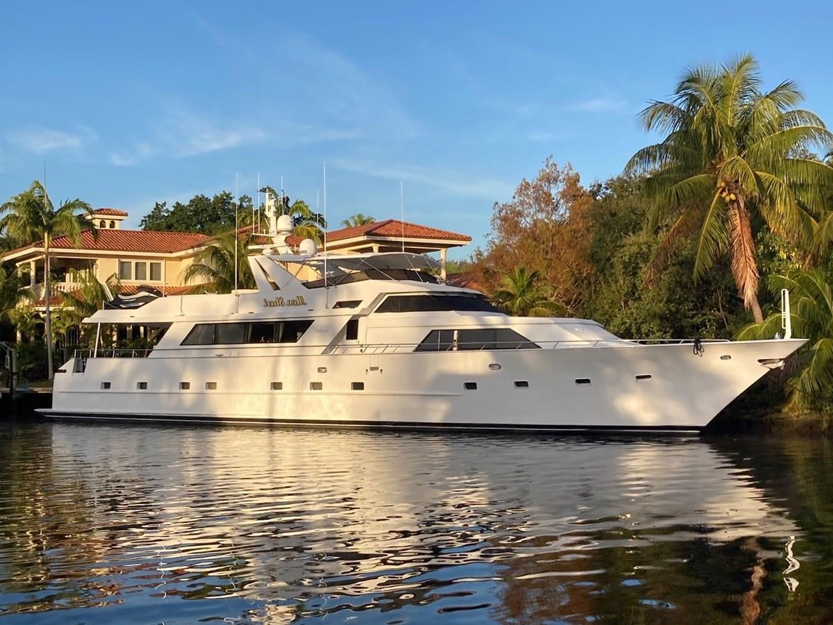a white yacht on the water aboard MON SHERI Yacht for Sale