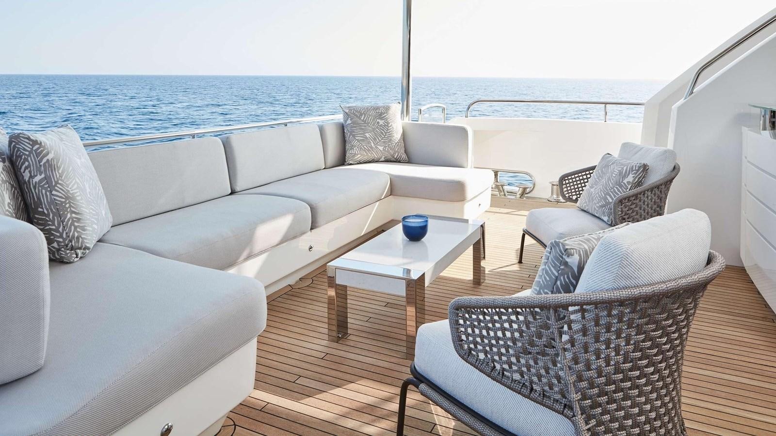 a living room with a large body of water aboard GHOST Yacht for Sale