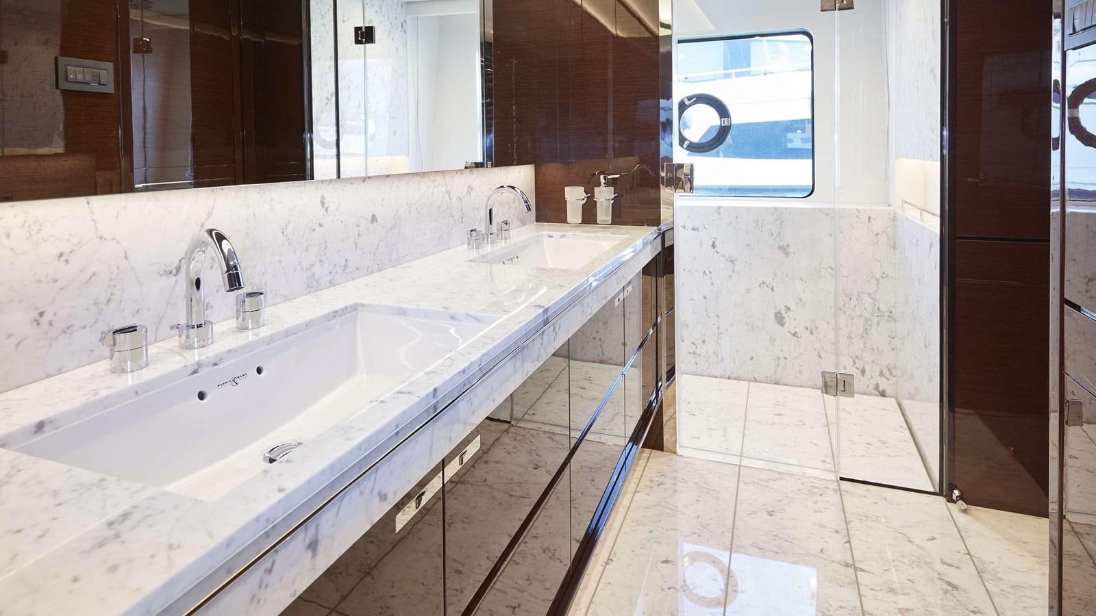 a bathroom with two sinks aboard GHOST Yacht for Sale