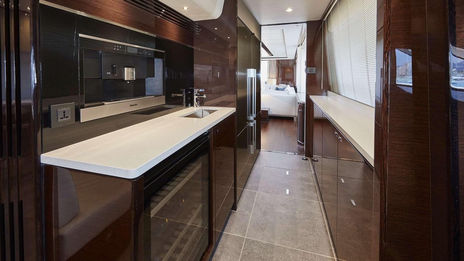 a large room with a counter and sinks aboard GHOST Yacht for Sale