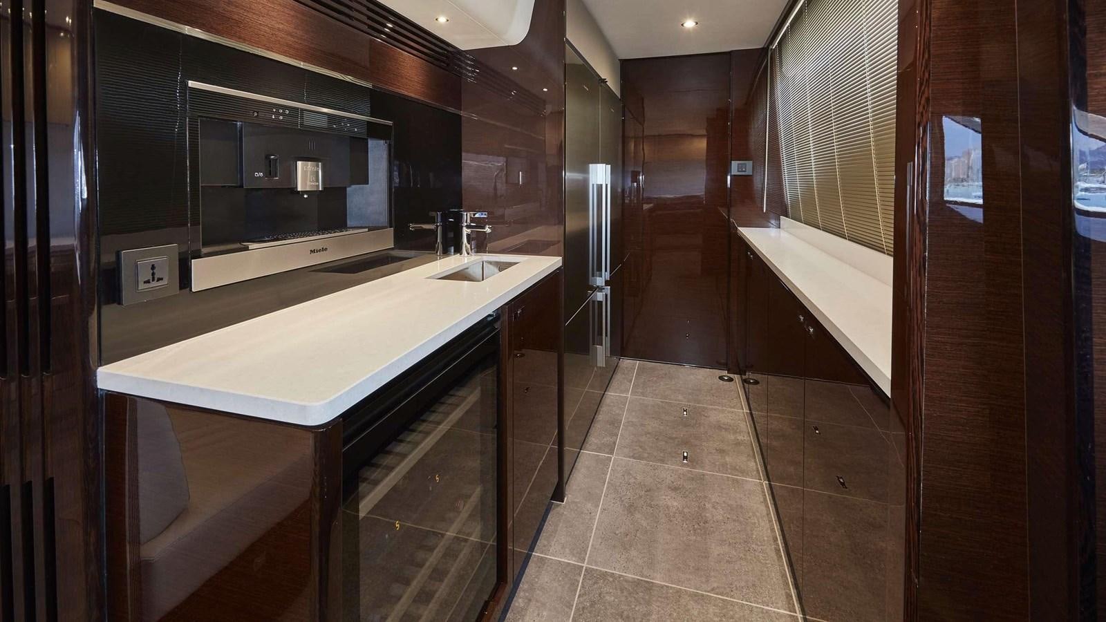a kitchen with a countertop aboard GHOST Yacht for Sale