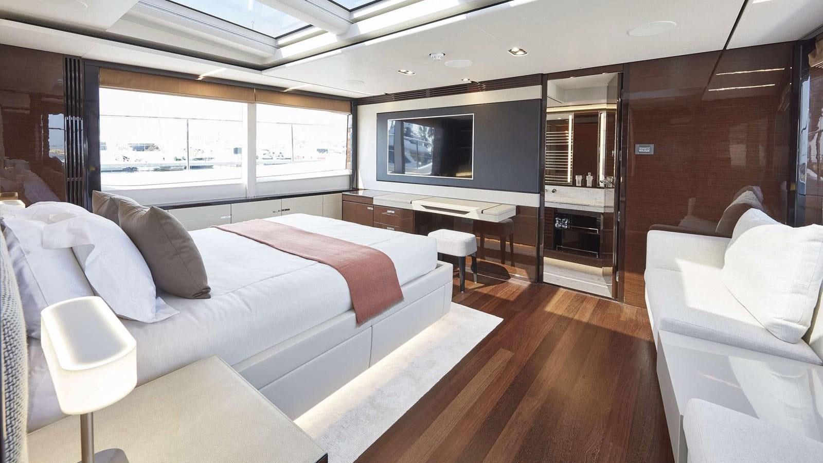 a room with a bed and a tv aboard GHOST Yacht for Sale