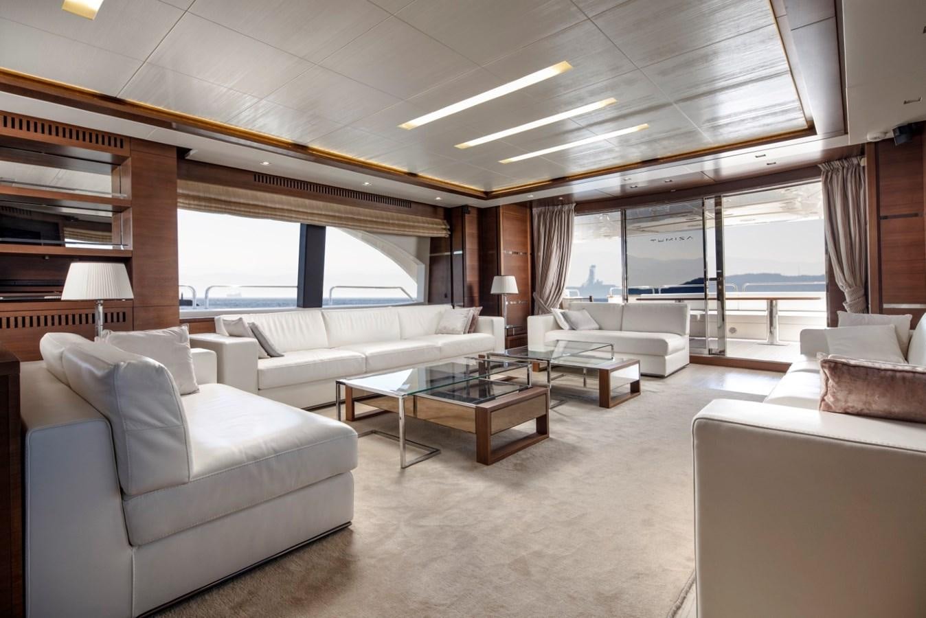 a living room with a large window aboard NIMIR Yacht for Sale