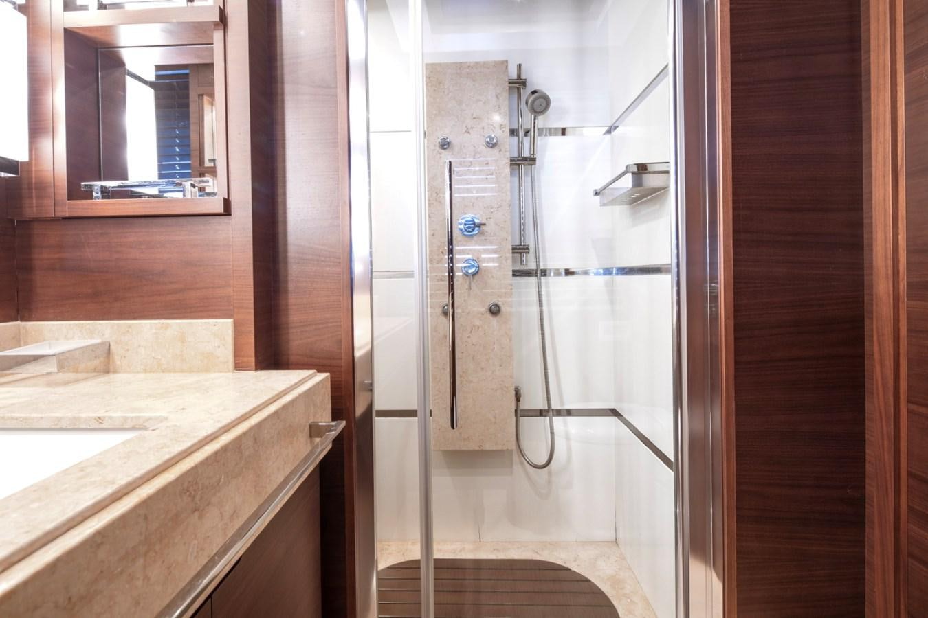 a bathroom with a shower unit aboard NIMIR Yacht for Sale