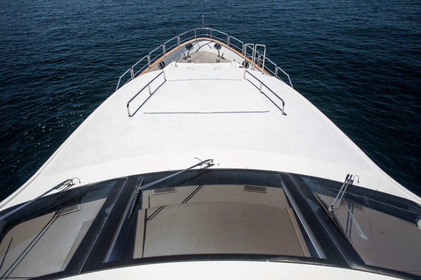 a white yacht on the water aboard NIMIR Yacht for Sale
