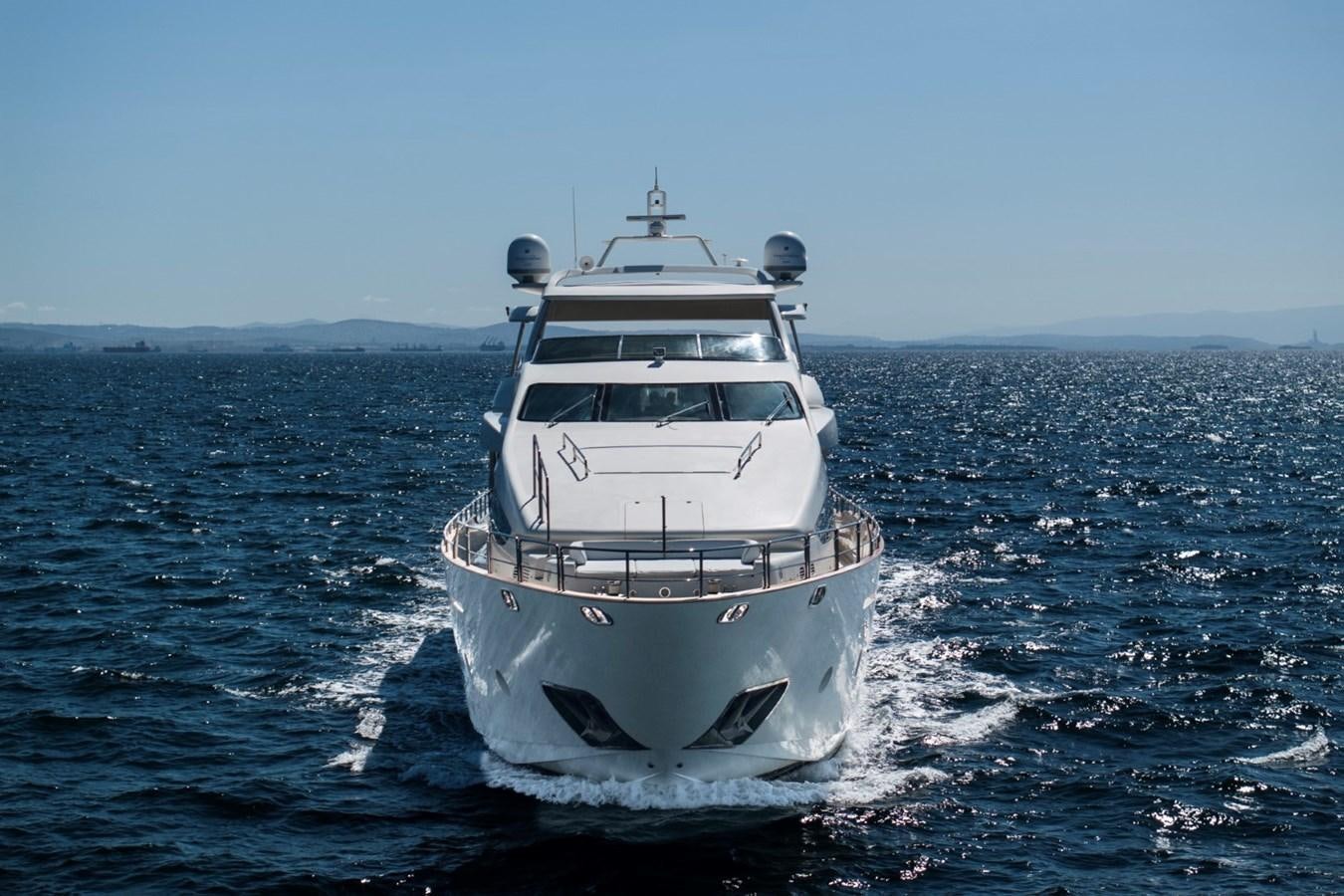 a white boat in the water aboard NIMIR Yacht for Sale