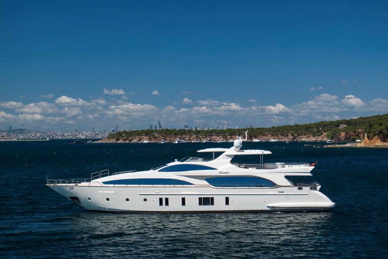 a white yacht in the water aboard NIMIR Yacht for Sale
