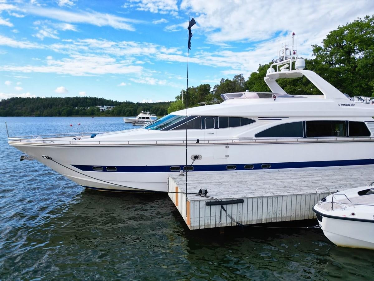 a couple of white yachts in a harbor aboard MALARPRINSESSAN Yacht for Sale
