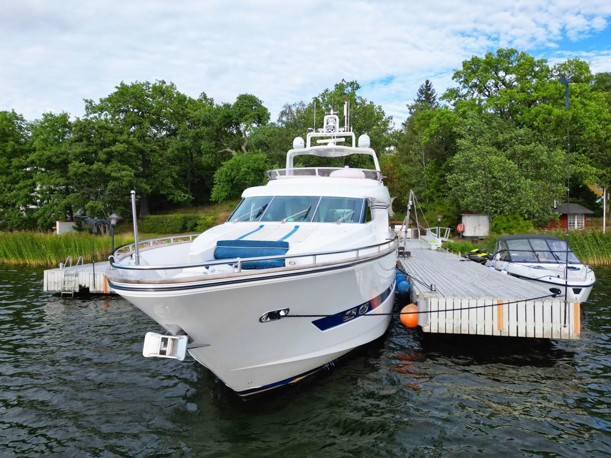 a couple of boats are parked in a harbor aboard MALARPRINSESSAN Yacht for Sale