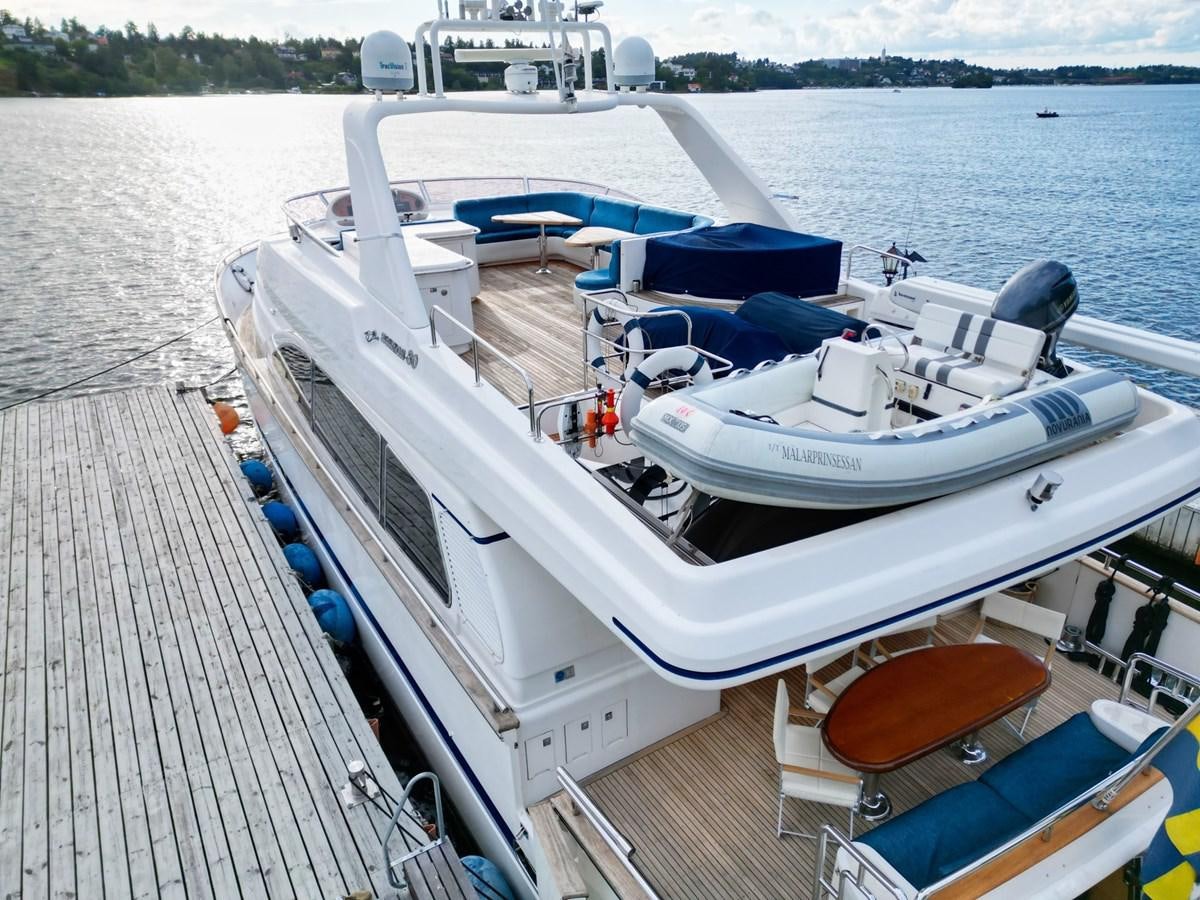 a boat docked at a pier aboard MALARPRINSESSAN Yacht for Sale