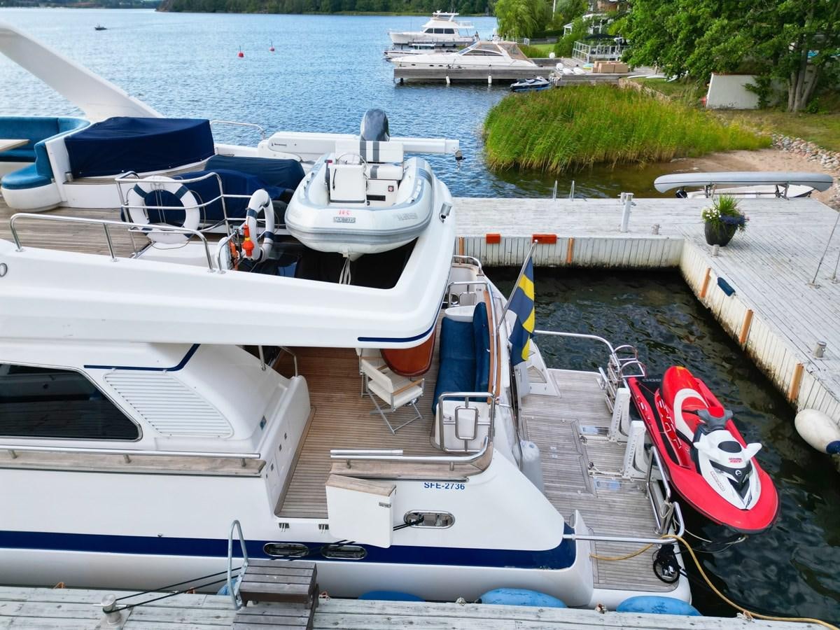 a boat docked at a pier aboard MALARPRINSESSAN Yacht for Sale