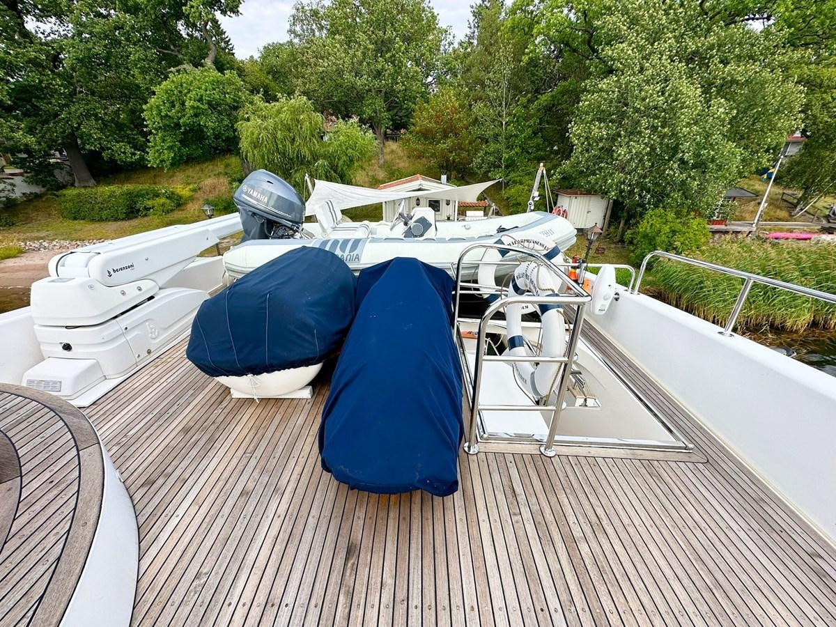 a boat on a deck aboard MALARPRINSESSAN Yacht for Sale