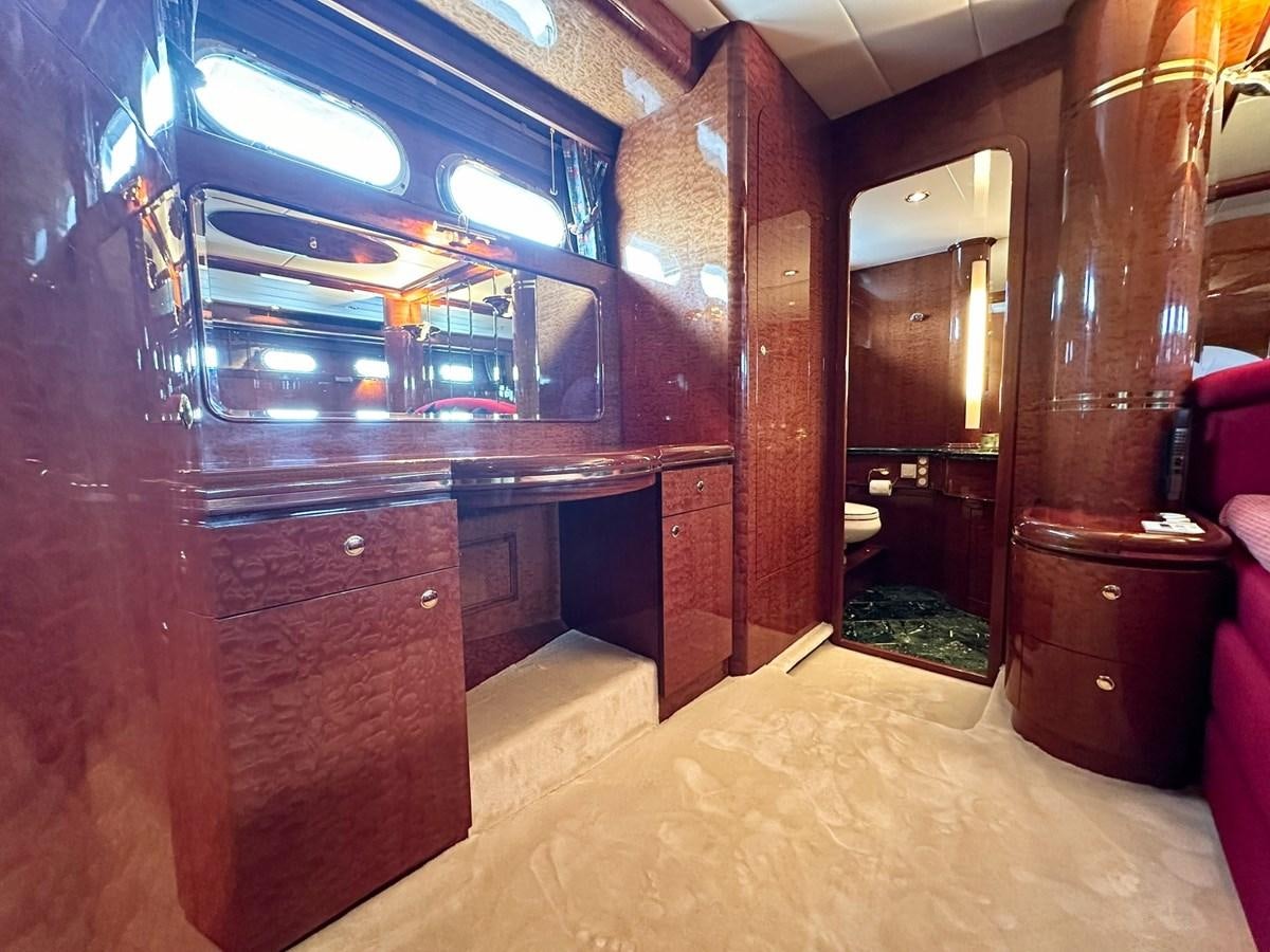a room with a dresser and a mirror aboard MALARPRINSESSAN Yacht for Sale
