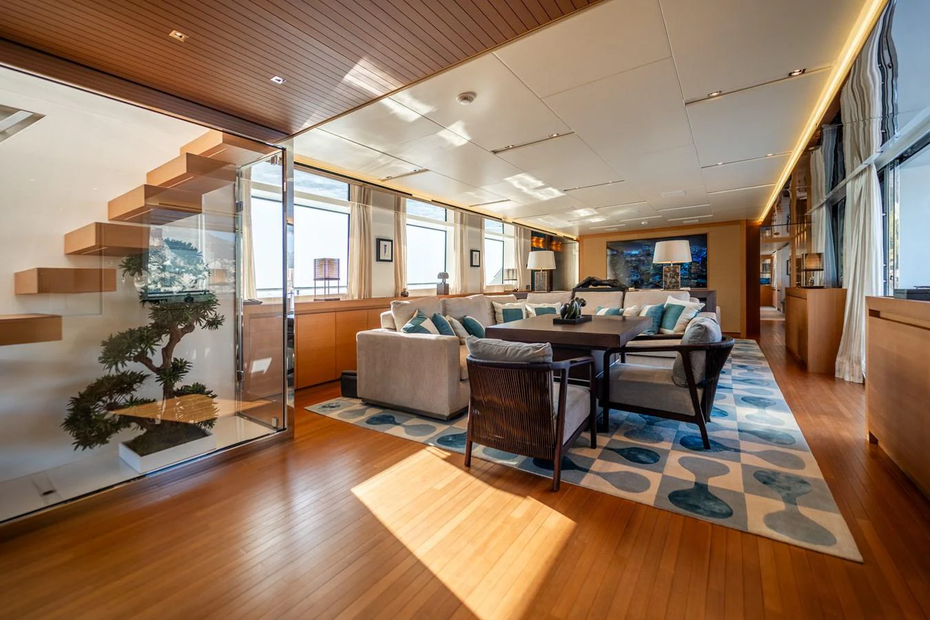a living room with a wood floor aboard BLUES Yacht for Sale