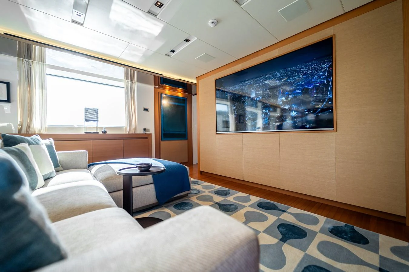 a room with a large screen aboard BLUES Yacht for Sale