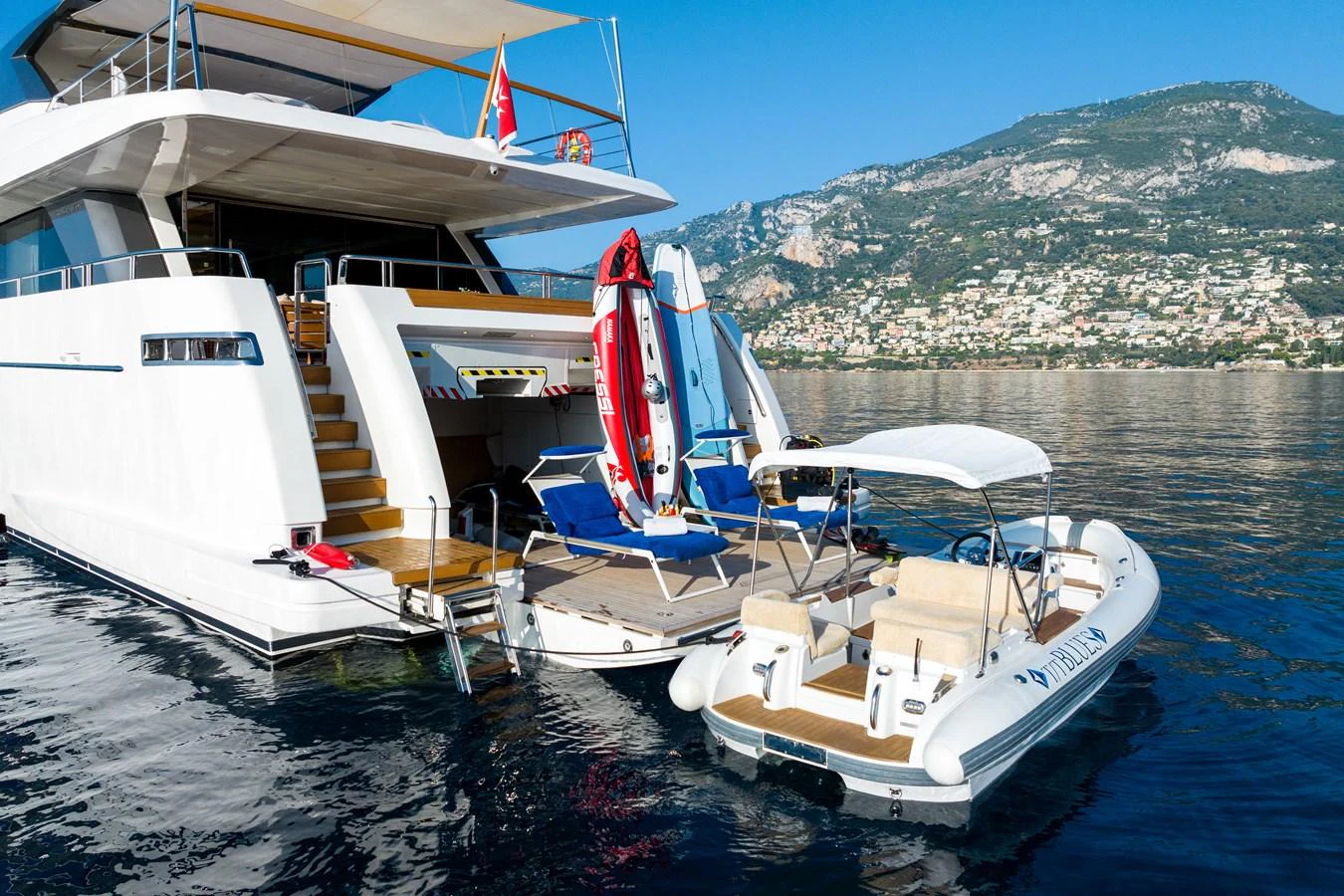 a boat docked at a pier aboard BLUES Yacht for Sale