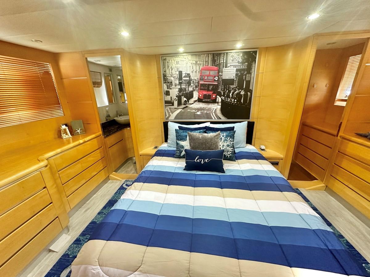 a bed in a room aboard NOTORIUS Yacht for Sale