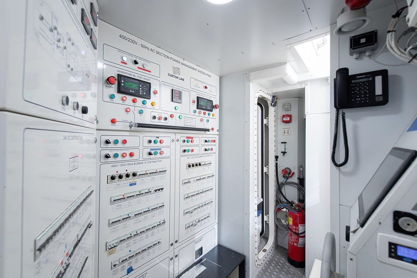 a room with white machines aboard SWEET LANE Yacht for Sale