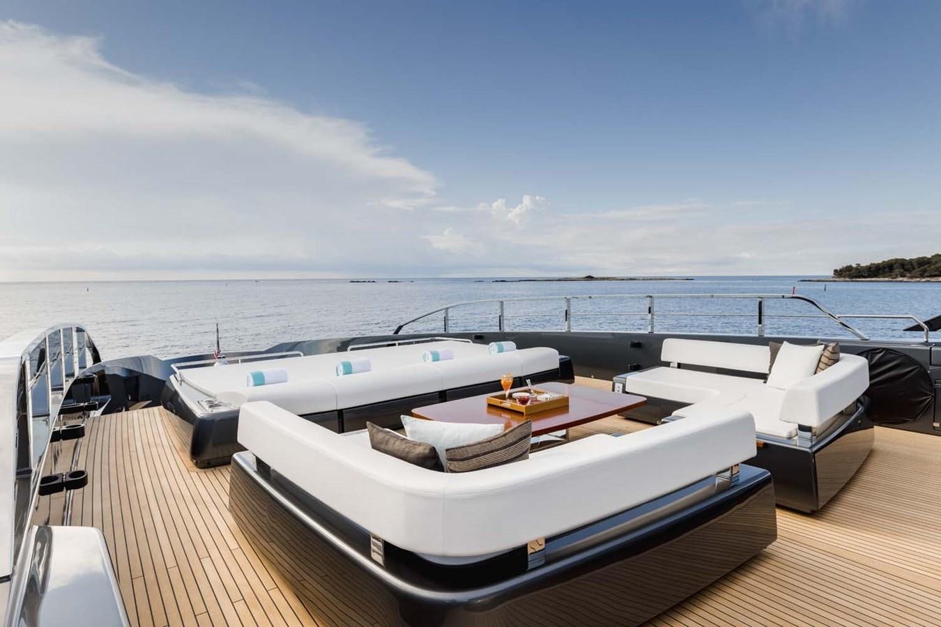 a boat on a deck aboard HULL #02 Yacht for Sale