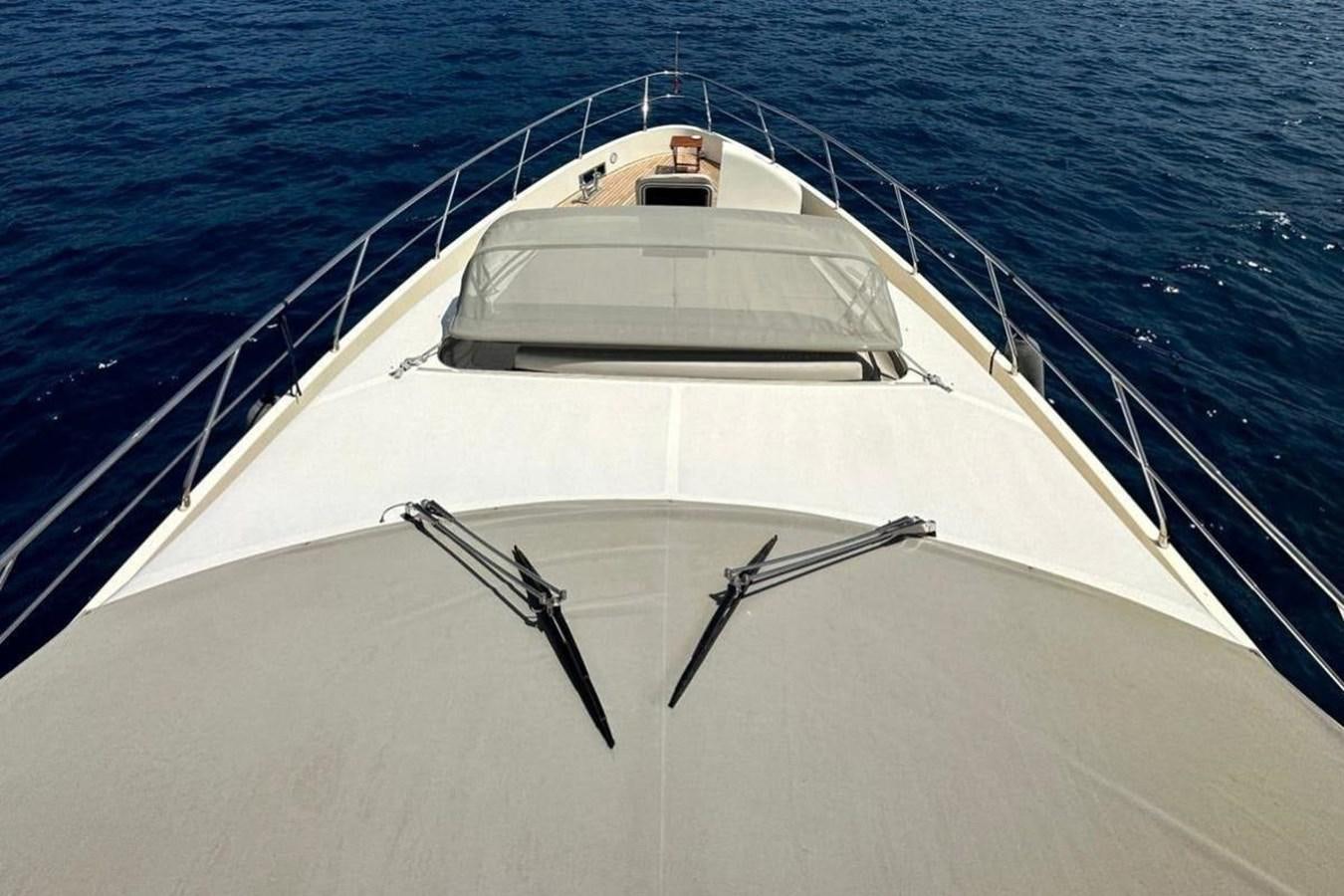 a white boat with a black symbol on it aboard AZIMUT 84/12 Yacht for Sale