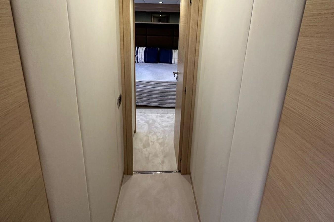 a door in a room aboard AZIMUT 84/12 Yacht for Sale