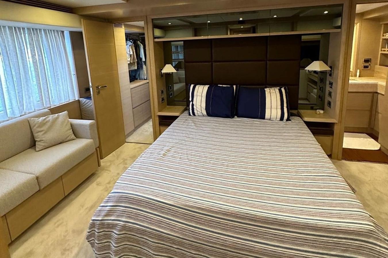 a bed in a room aboard AZIMUT 84/12 Yacht for Sale
