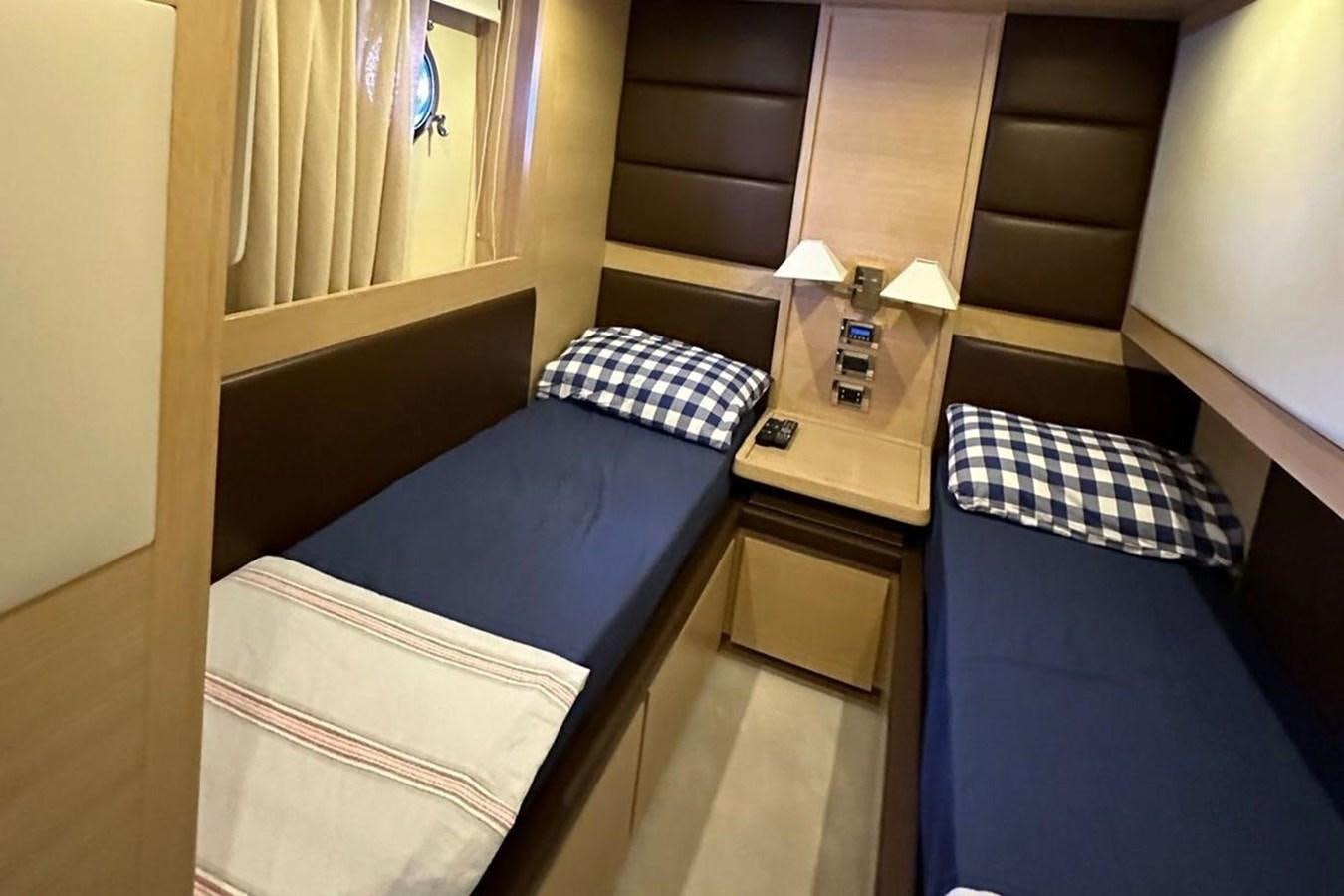 a room with two beds aboard AZIMUT 84/12 Yacht for Sale