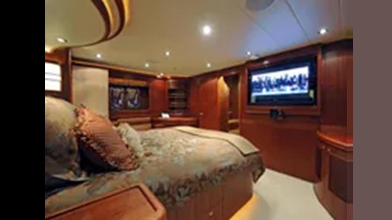 a tv on a wall aboard 2009 HORIZON VISION 74 Yacht for Sale