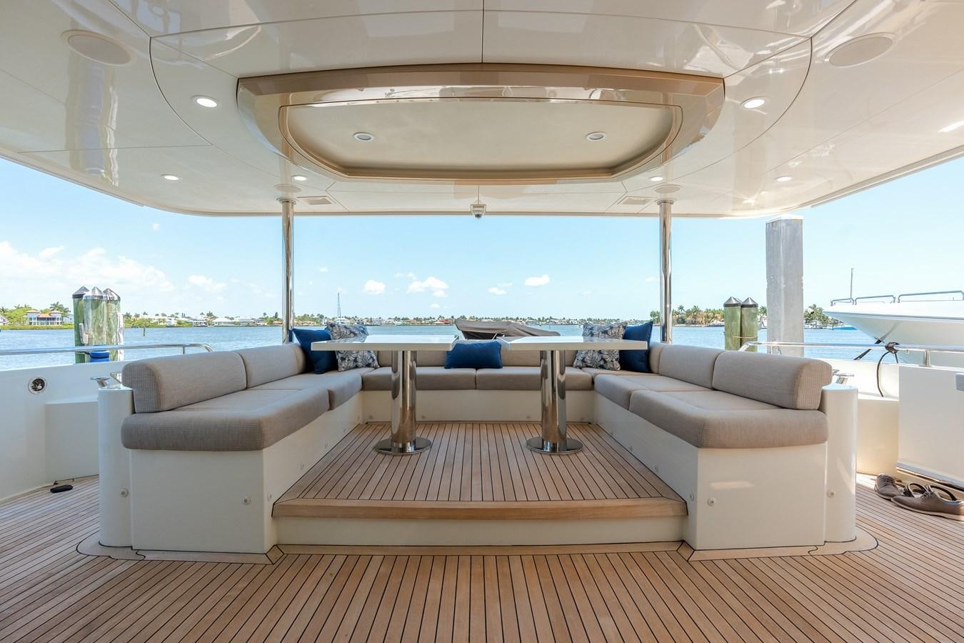 a large living room with a large window aboard WIGGLE ROOM Yacht for Sale