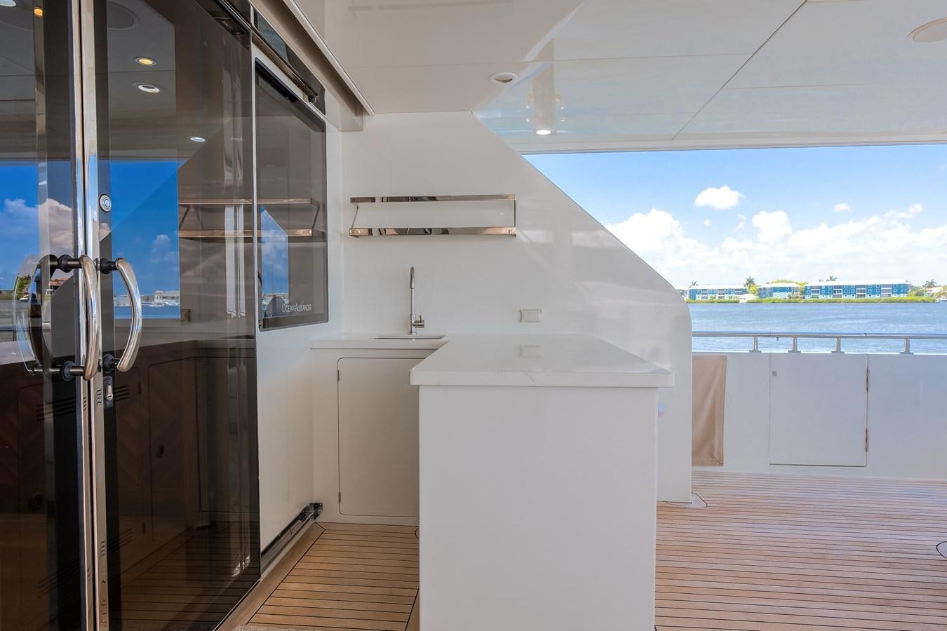 a room with a sliding door aboard WIGGLE ROOM Yacht for Sale
