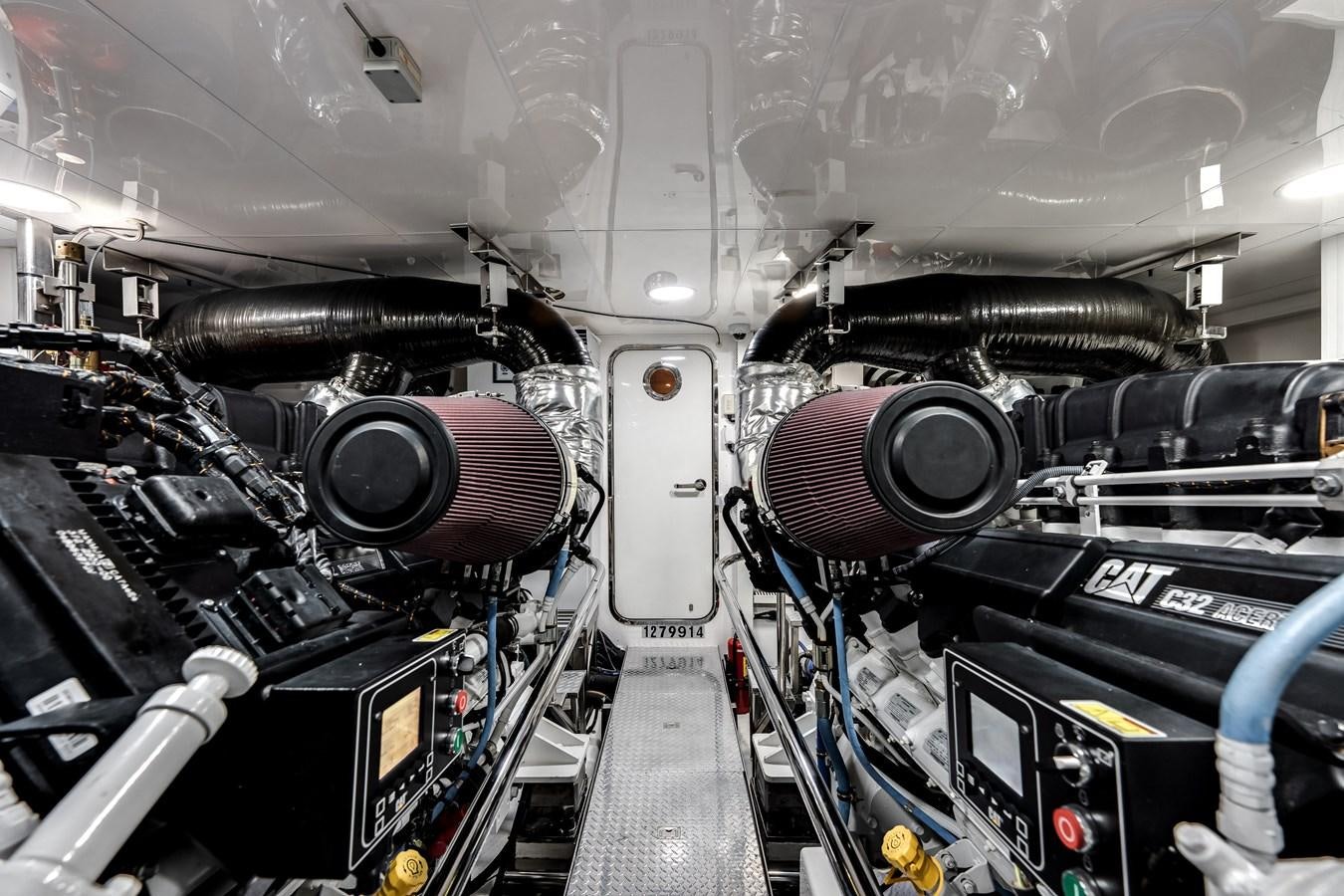 a close-up of a car engine aboard WIGGLE ROOM Yacht for Sale