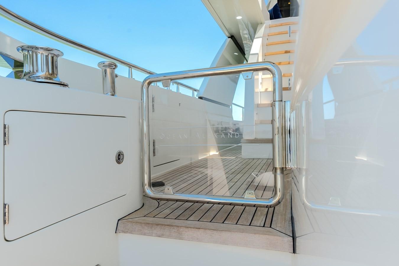 a metal staircase with metal railings aboard WIGGLE ROOM Yacht for Sale