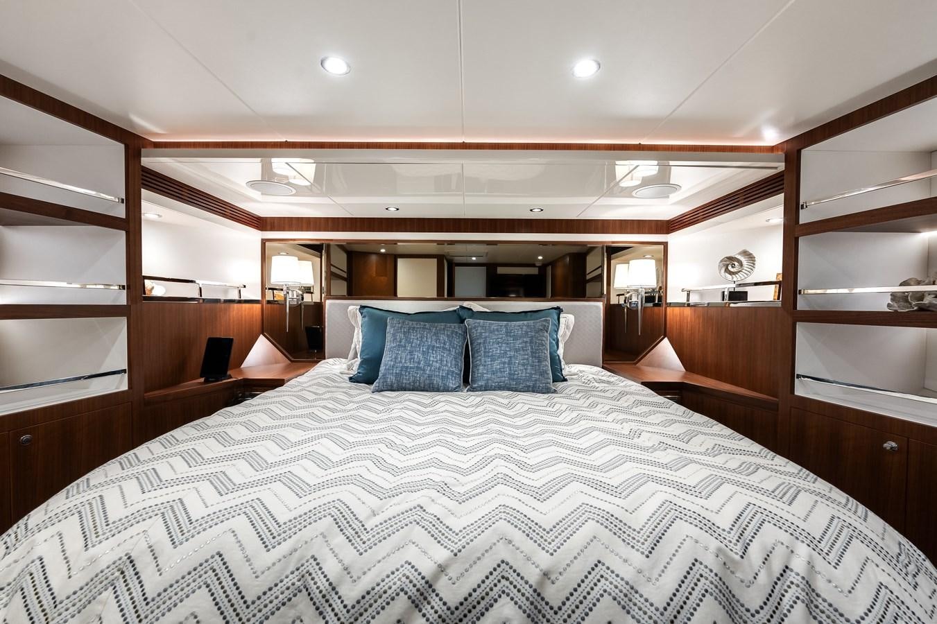 a large bed in a room aboard WIGGLE ROOM Yacht for Sale