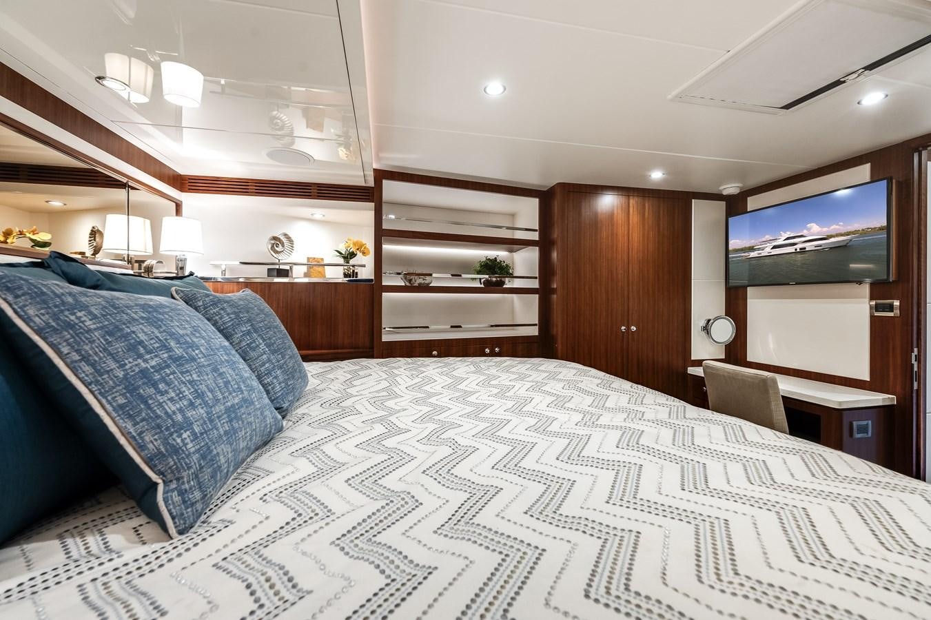 a large bed in a room aboard WIGGLE ROOM Yacht for Sale