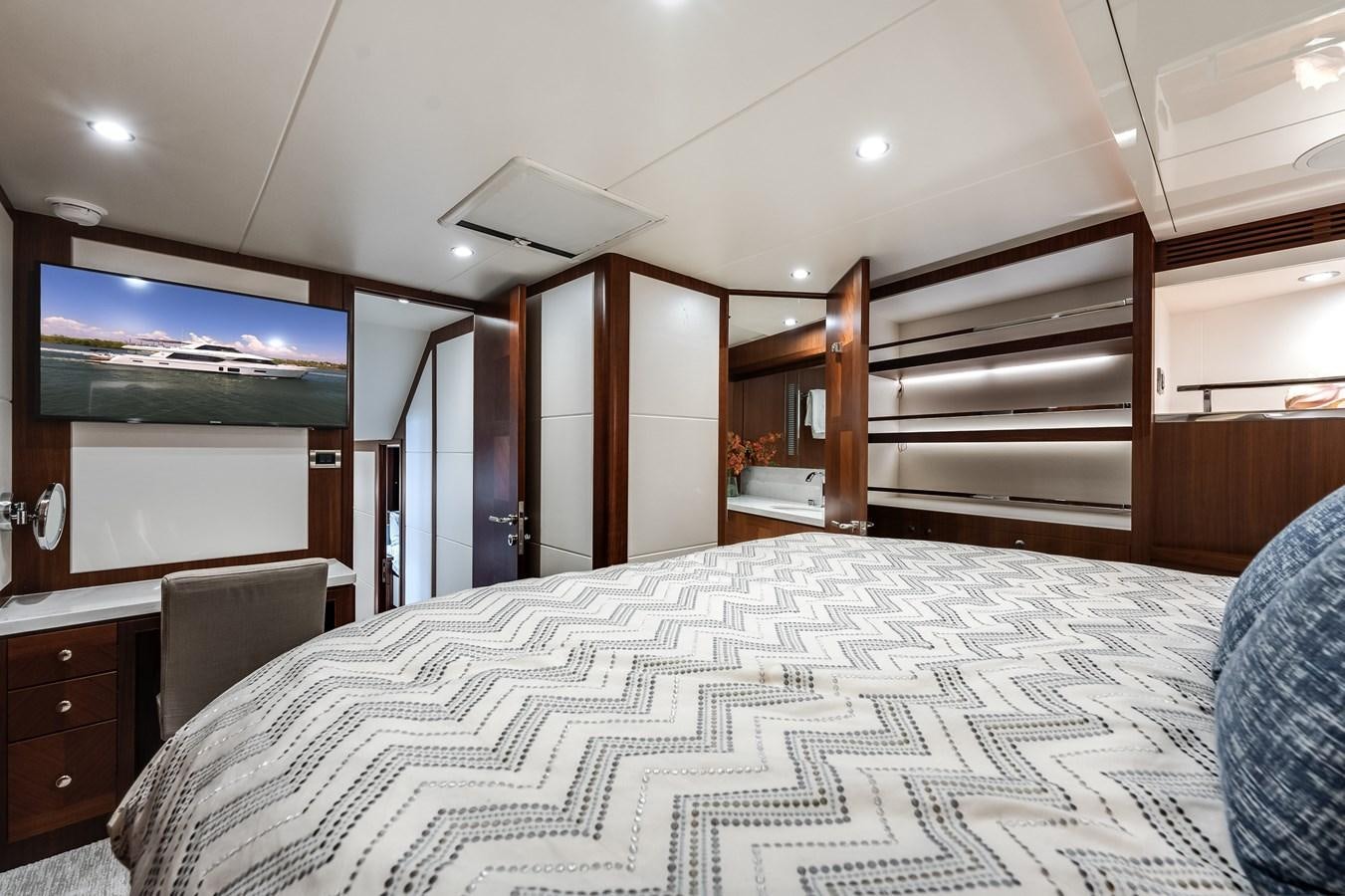 a bed in a room aboard WIGGLE ROOM Yacht for Sale