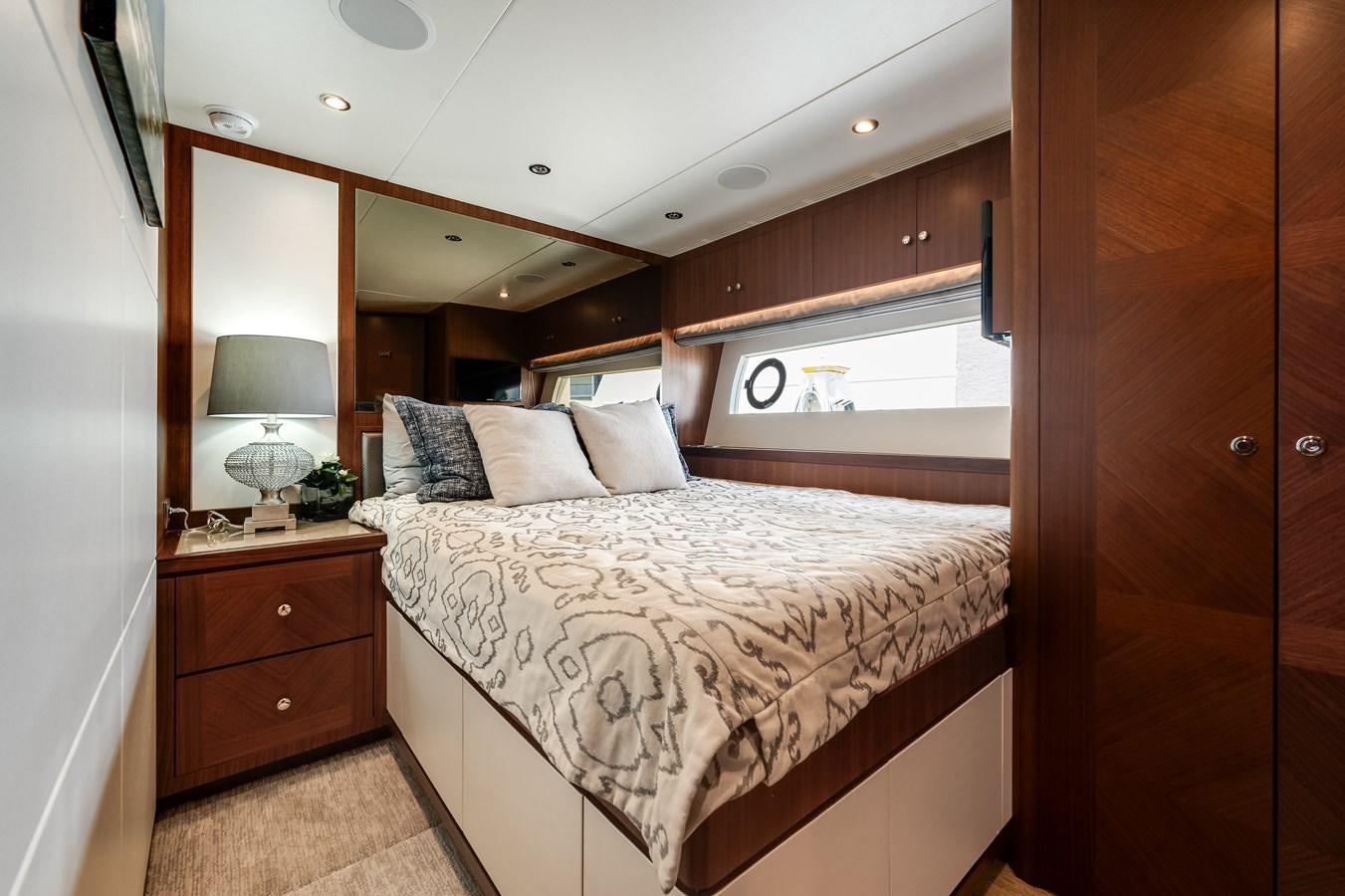 a bed in a room aboard WIGGLE ROOM Yacht for Sale