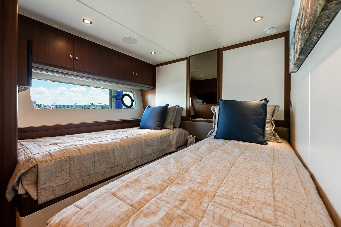 a room with two beds aboard WIGGLE ROOM Yacht for Sale