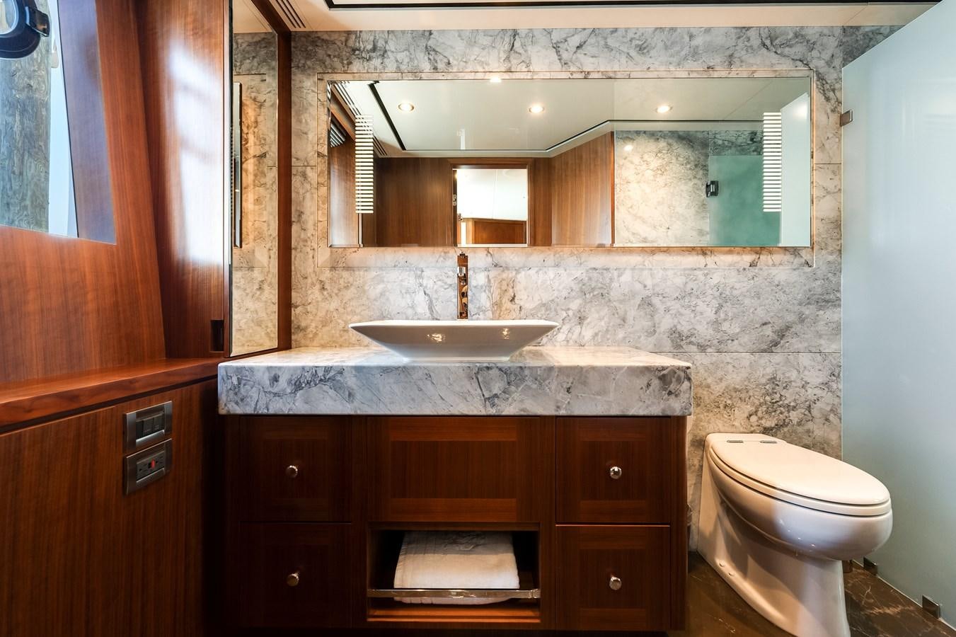 a bathroom with a sink and a toilet aboard WIGGLE ROOM Yacht for Sale