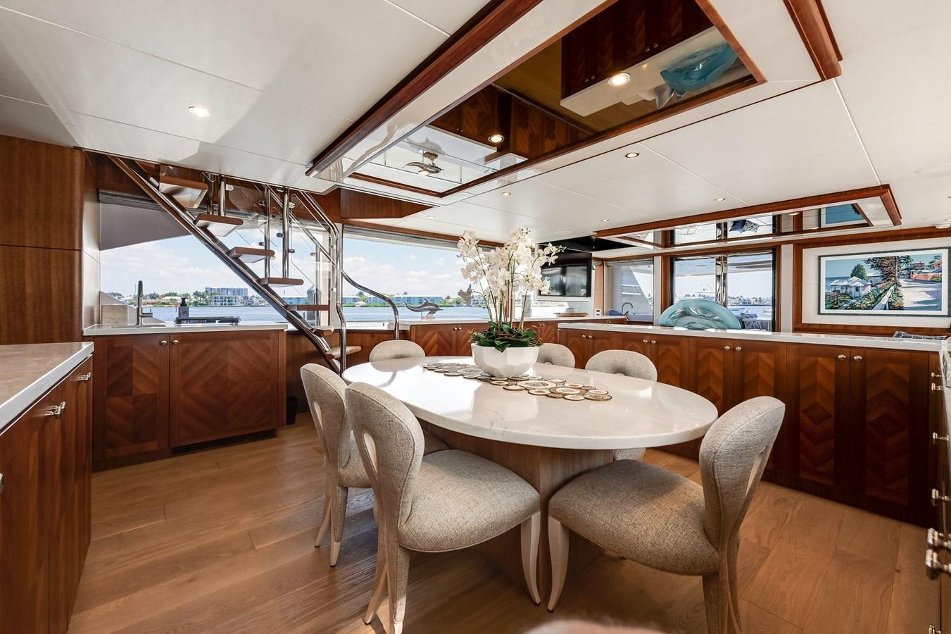 a dining table in a kitchen aboard WIGGLE ROOM Yacht for Sale