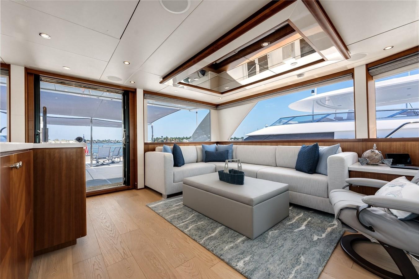 a room with a couch and a table aboard WIGGLE ROOM Yacht for Sale