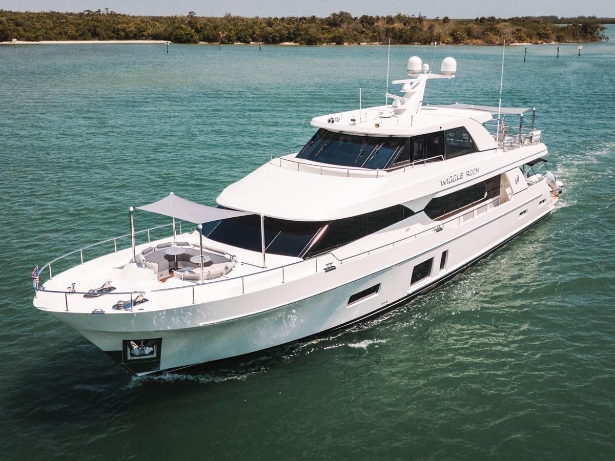 a white boat on the water aboard WIGGLE ROOM Yacht for Sale
