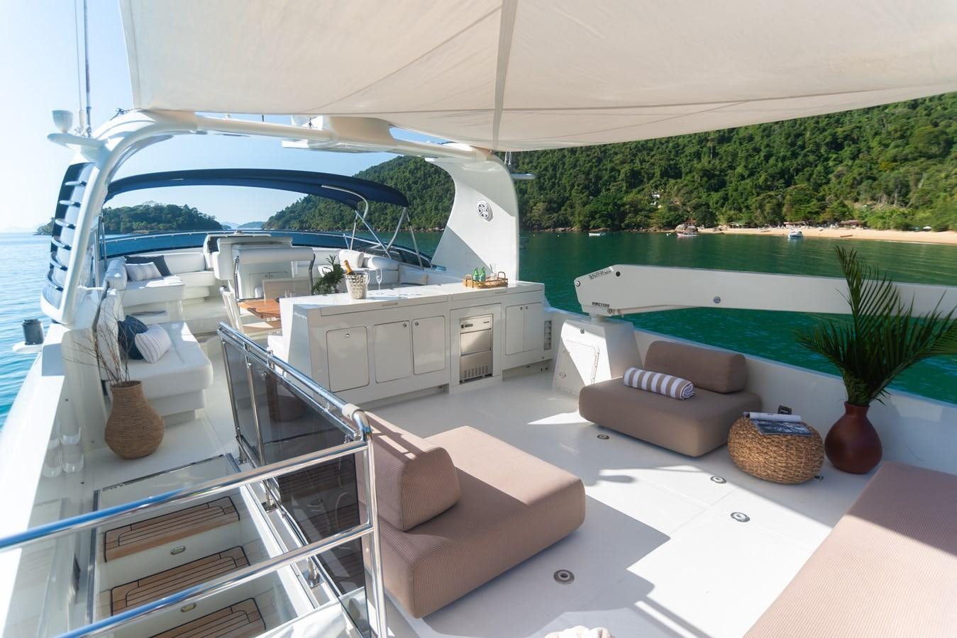 a room with a couch and a pool aboard TATI Yacht for Sale