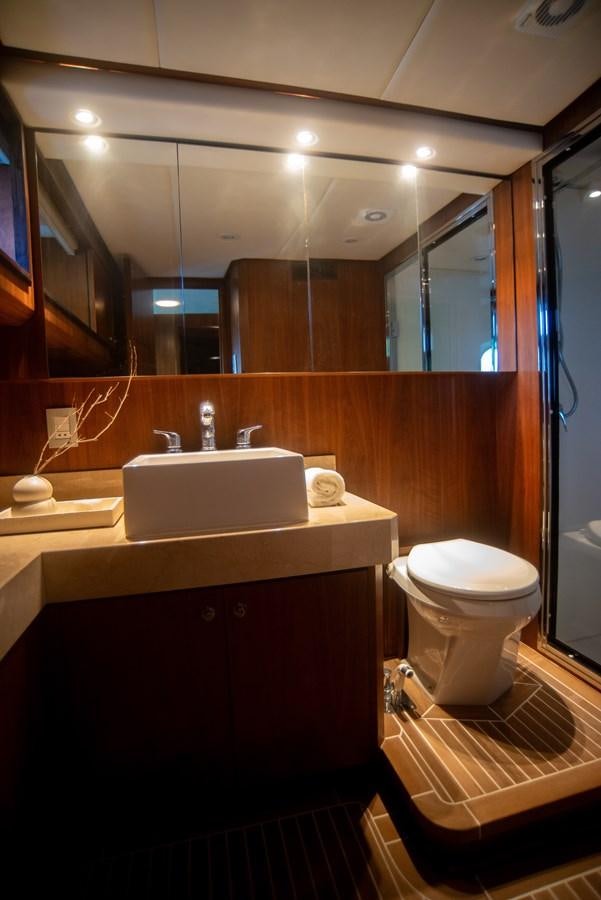 a bathroom with a sink and a toilet aboard TATI Yacht for Sale