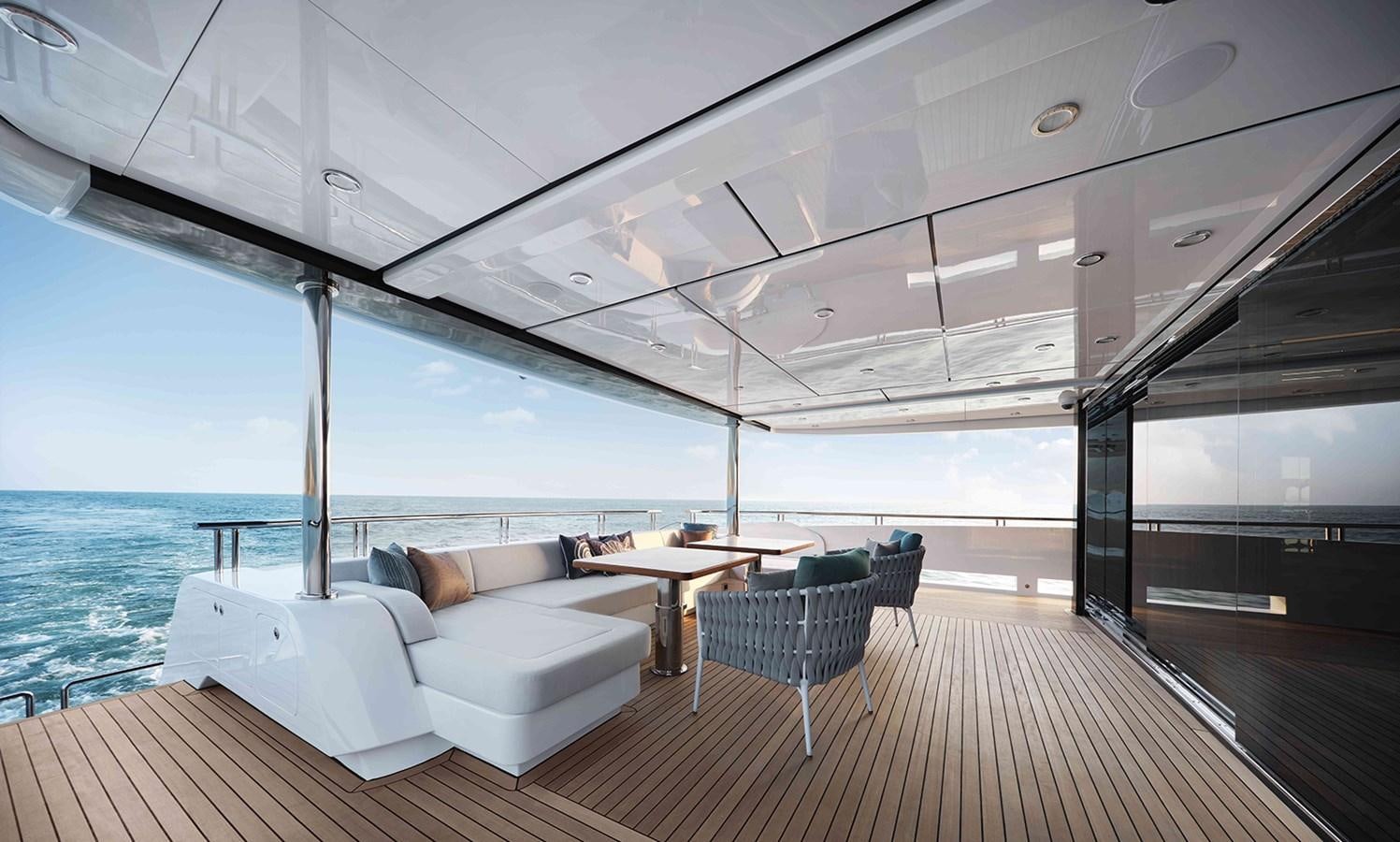 a room with a table and chairs aboard HEYSEA ASTERIA 139/3 Yacht for Sale