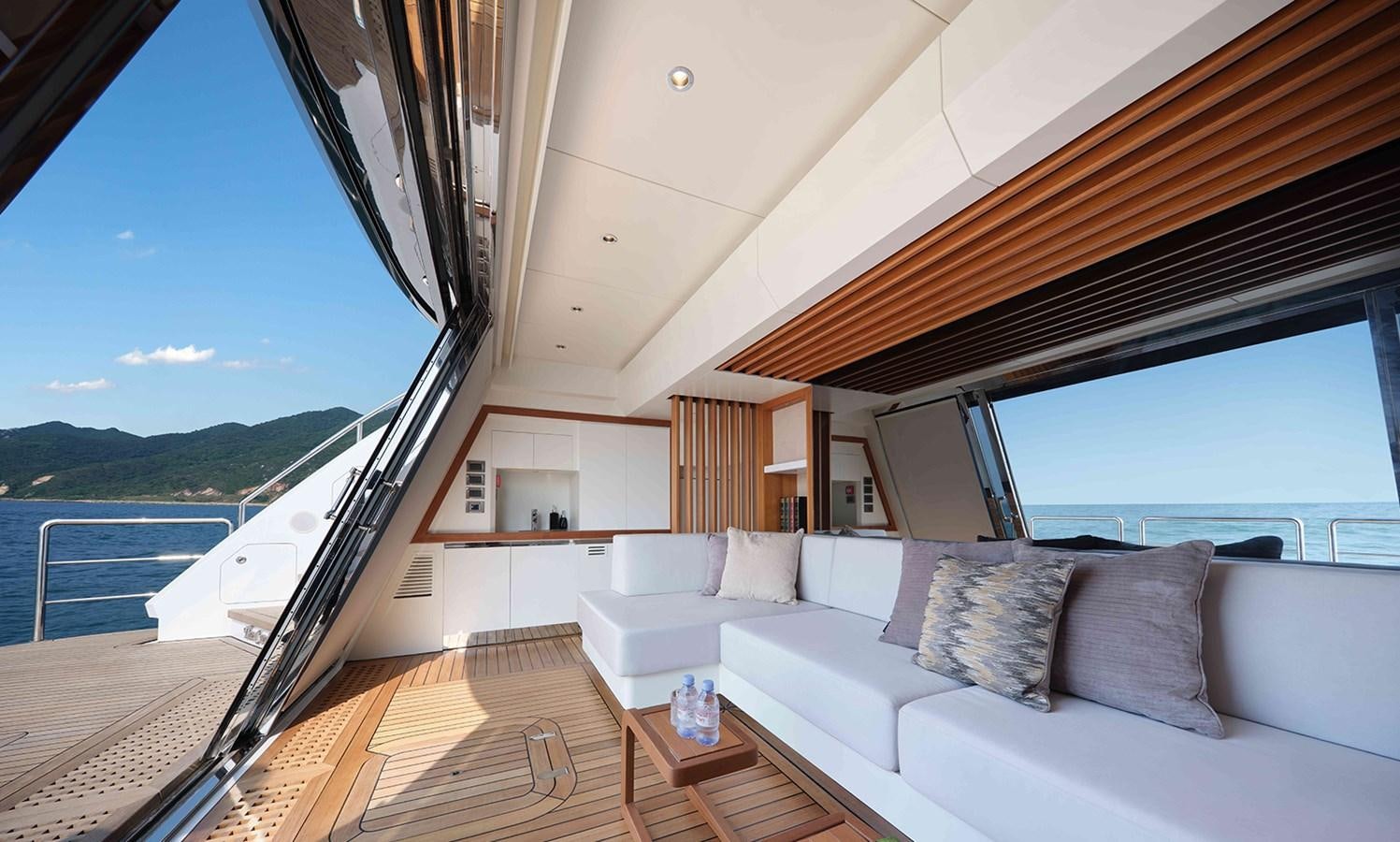 a large living room with a large balcony aboard HEYSEA ASTERIA 139/3 Yacht for Sale