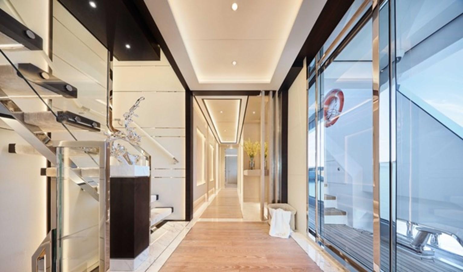 a hallway with glass doors aboard HEYSEA ASTERIA 139/3 Yacht for Sale