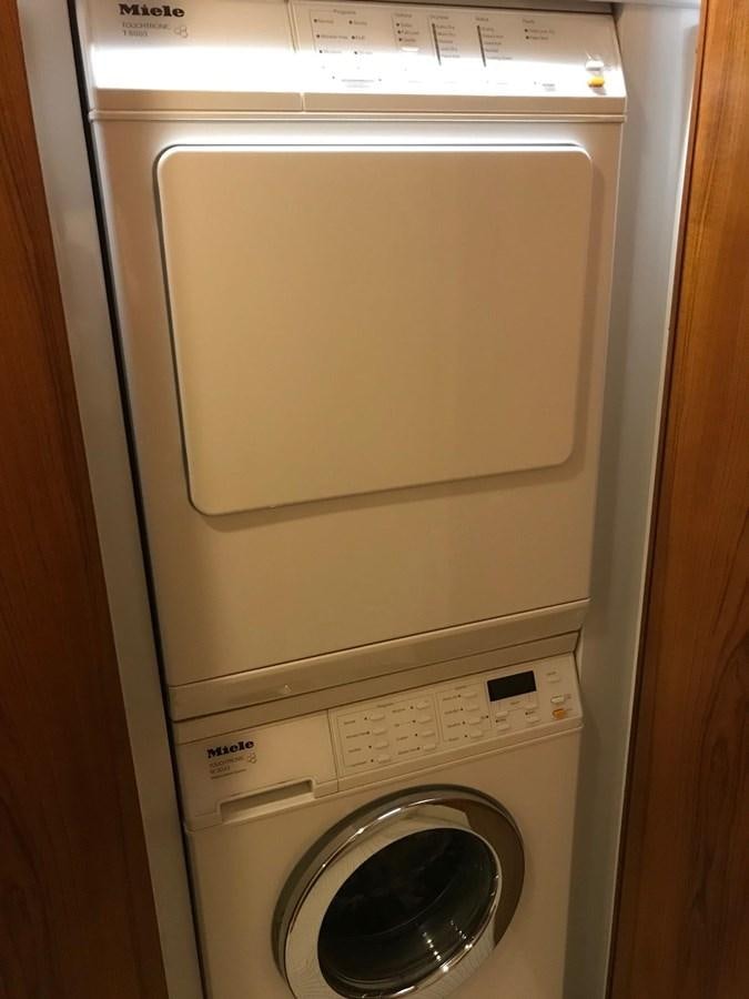 a white washing machine aboard IN FLIGHT Yacht for Sale