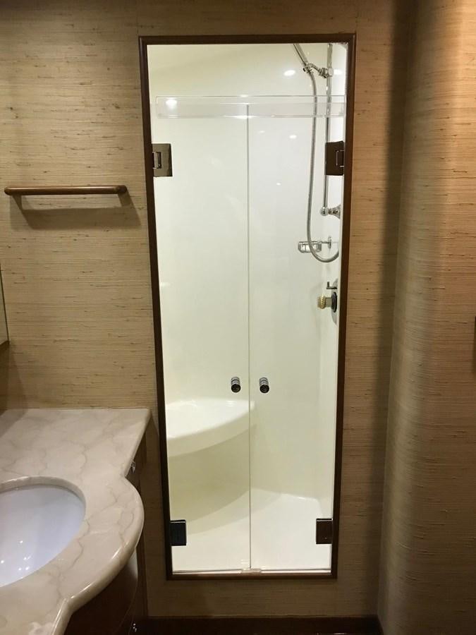 a shower unit in a bathroom aboard IN FLIGHT Yacht for Sale